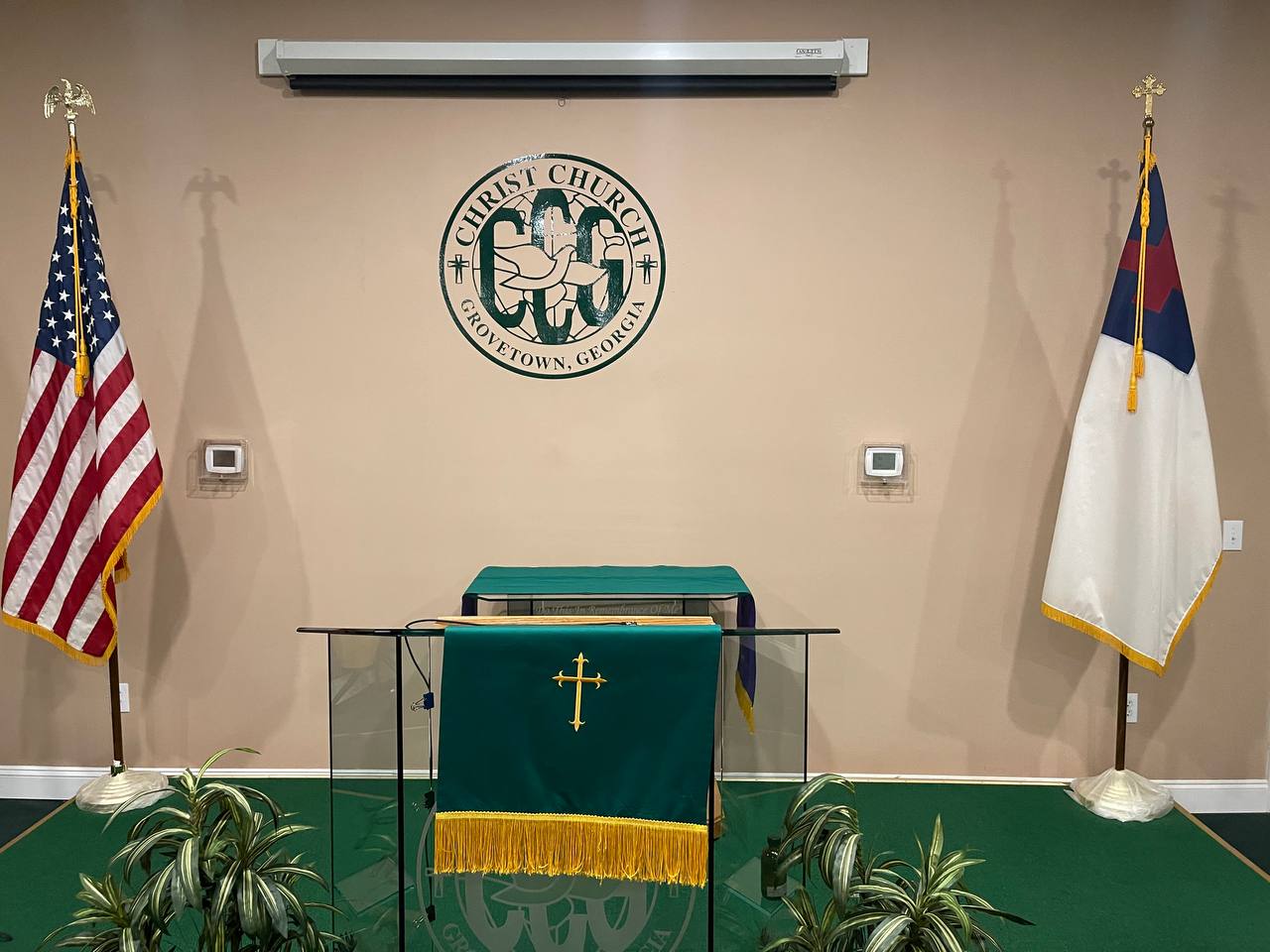 Close view of the Christ Church of Grovetown pulpit and church emblem